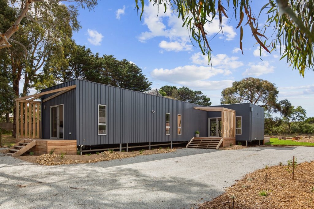 Our Heyley project’s dark facade features vertical Colorbond steel cladding.