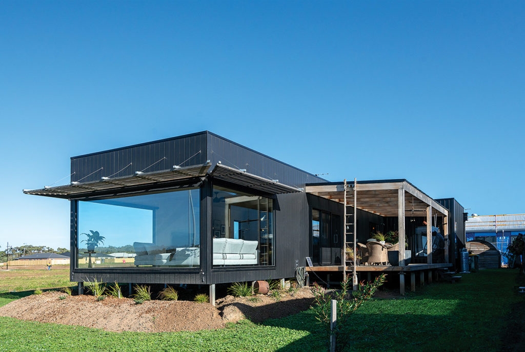 Our black house in Everton showcases a durable Weathertex facade perfect for longevity in its beachside location.